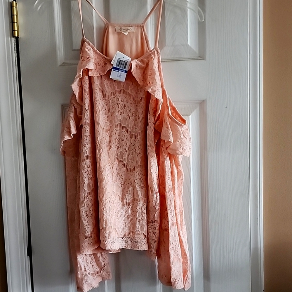 Peach colored size large mesh off the shoulder shirt